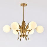 modern-ophelia-glass-globe-chandelier-with-wrought-iron-and-feather-detail-in-antique-gold