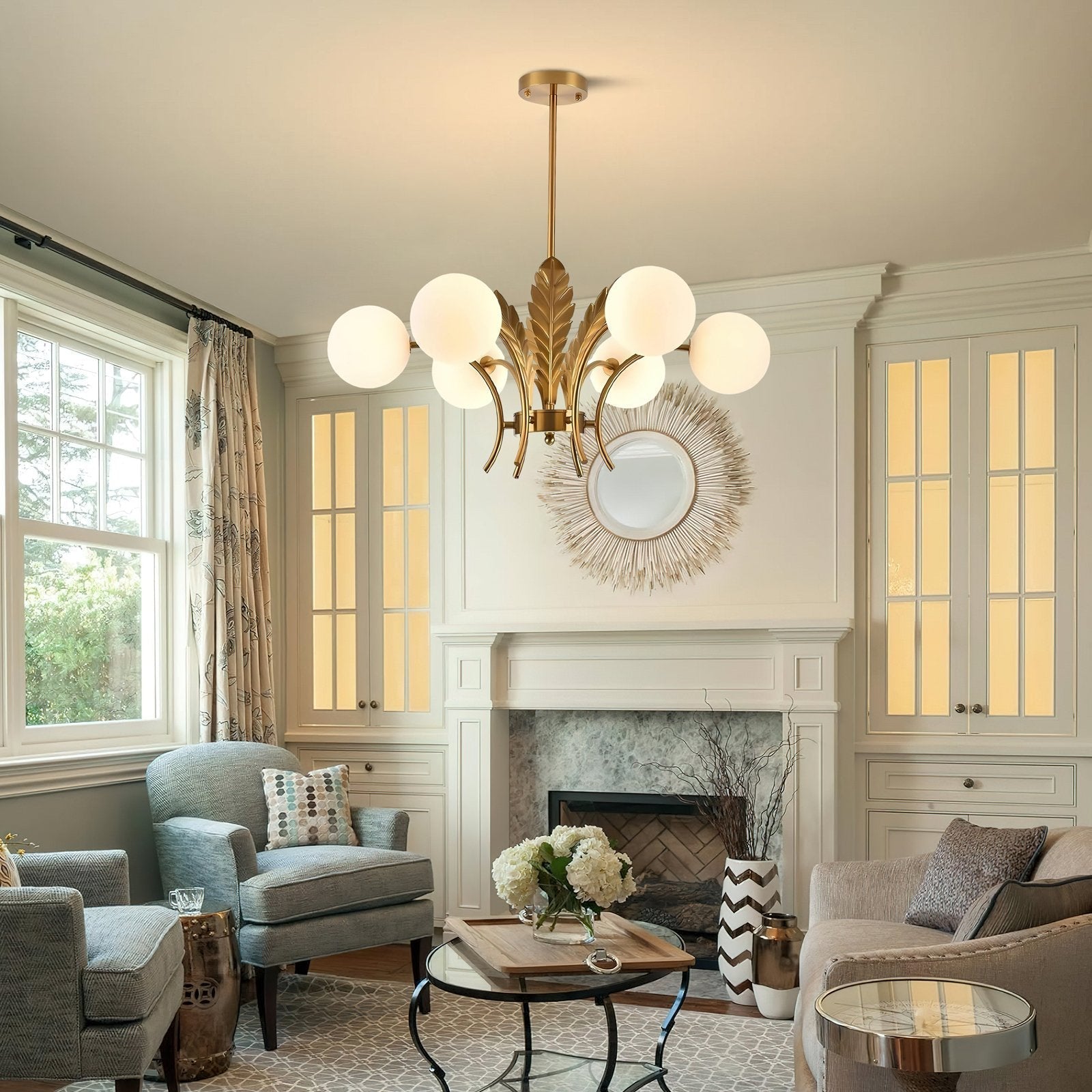 modern-ophelia-glass-globe-chandelier-with-wrought-iron-and-feather-detail-in-antique-gold