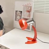 stylish-orange-and-chrome-metal-bedside-lamp-with-vibrant-apple-green-wire