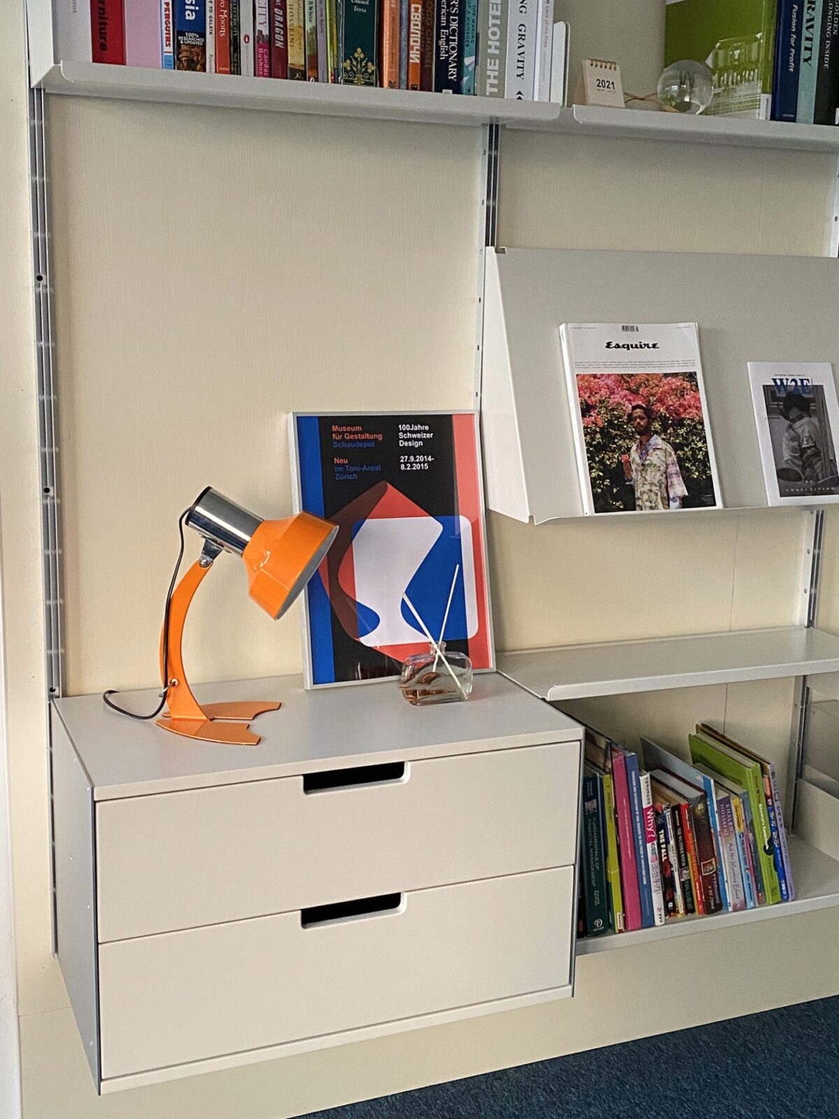stylish-orange-and-chrome-metal-bedside-lamp-with-vibrant-apple-green-wire