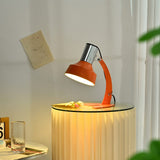 stylish-orange-and-chrome-metal-bedside-lamp-with-vibrant-apple-green-wire