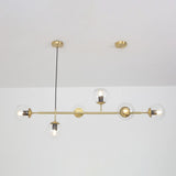contemporary-multi-glass-globe-pendant-light-with-round-orb-shades-and-polished-brass-frame