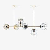 contemporary-multi-glass-globe-pendant-light-with-round-orb-shades-and-polished-brass-frame