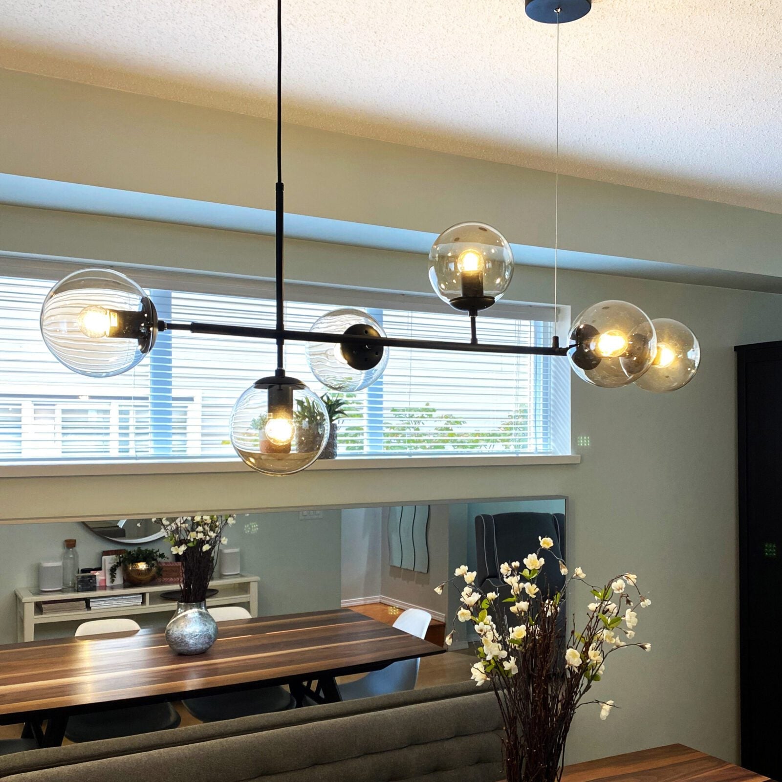 contemporary-multi-glass-globe-pendant-light-with-round-orb-shades-and-polished-brass-frame