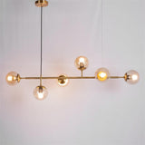 contemporary-multi-glass-globe-pendant-light-with-round-orb-shades-and-polished-brass-frame