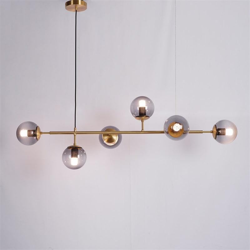 contemporary-multi-glass-globe-pendant-light-with-round-orb-shades-and-polished-brass-frame