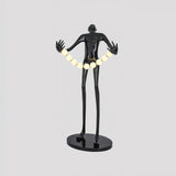Modern Orb Juggler Sculpture Floor Lamp Artistic LED Uplight for Contemporary Living Rooms