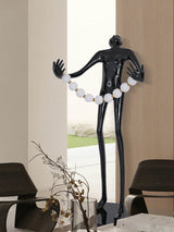 Modern Orb Juggler Sculpture Floor Lamp Artistic LED Uplight for Contemporary Living Rooms
