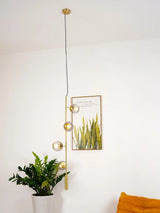 modern-brass-and-glass-sphere-pendant-light-industrial-globe-hanging-chandelier