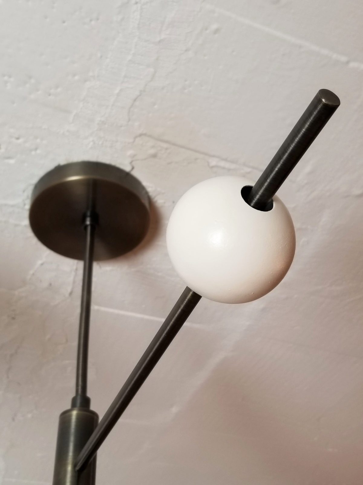 modern-orbital-3-arm-articulated-glass-globe-chandelier-in-copper-and-bronze-finish