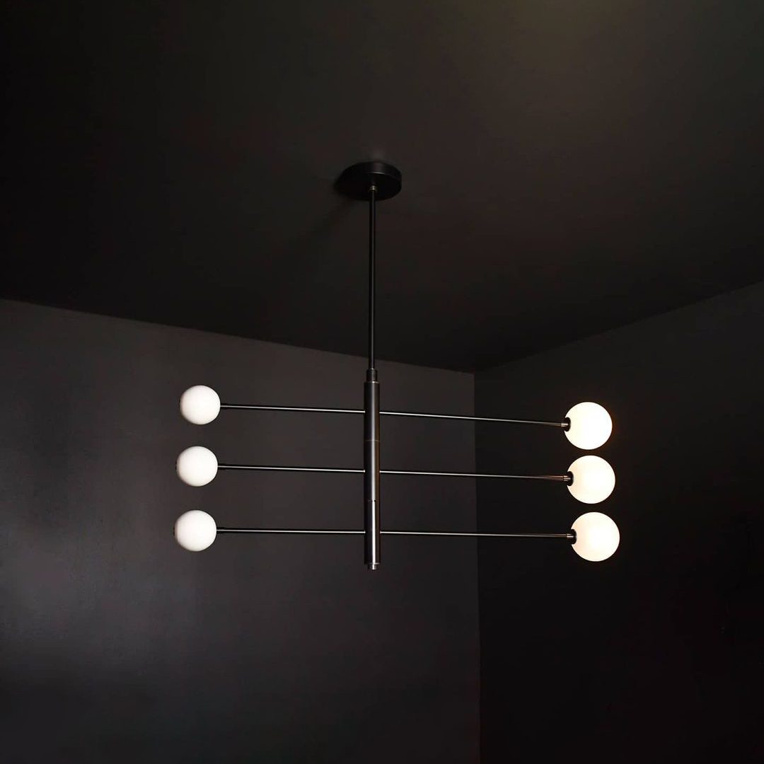 modern-orbital-3-arm-articulated-glass-globe-chandelier-in-copper-and-bronze-finish