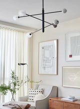 modern-orbital-3-arm-articulated-glass-globe-chandelier-in-copper-and-bronze-finish