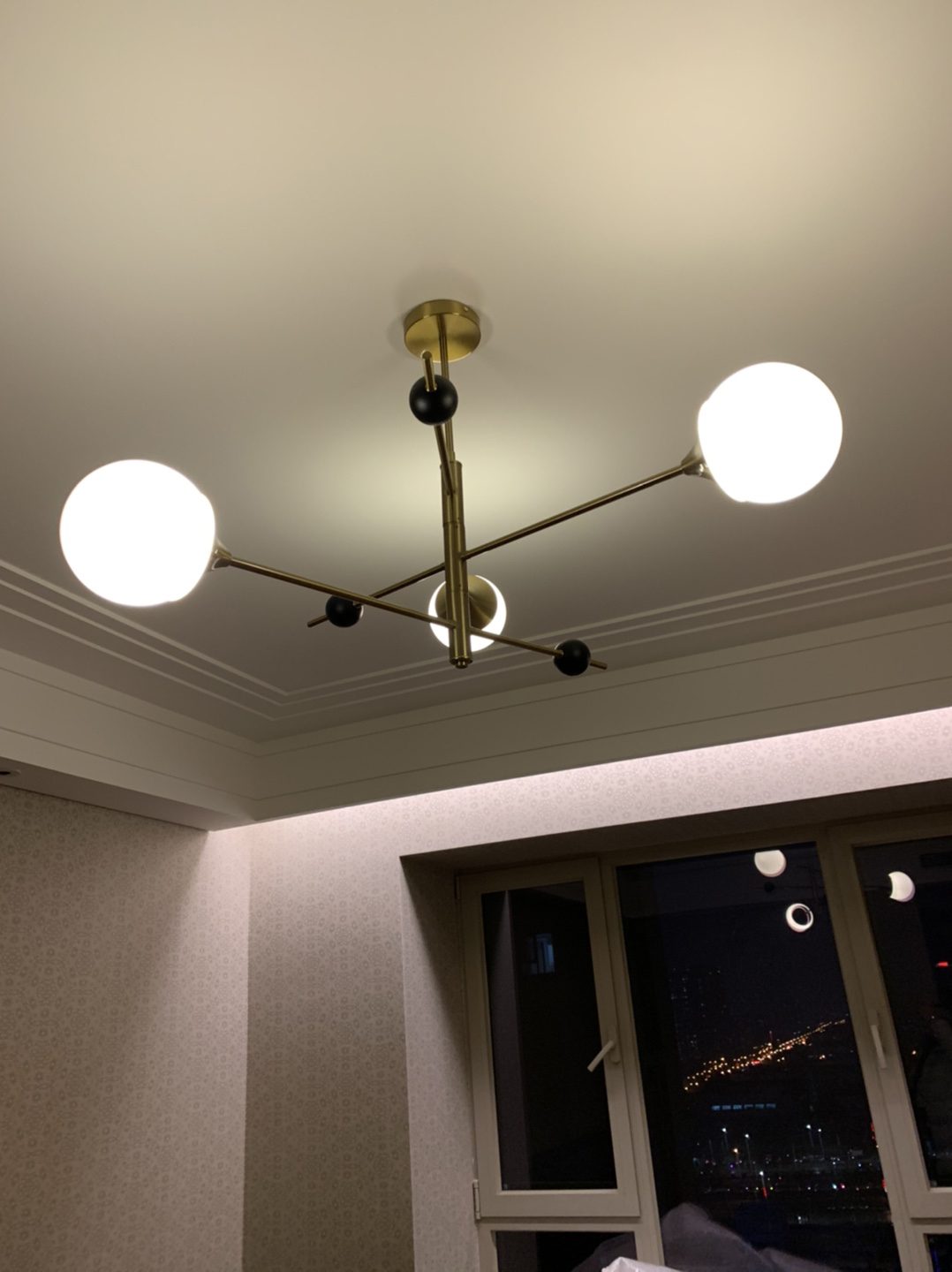 modern-orbital-3-arm-articulated-glass-globe-chandelier-in-copper-and-bronze-finish