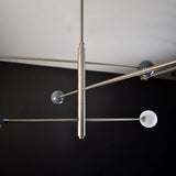 modern-orbital-3-arm-articulated-glass-globe-chandelier-in-copper-and-bronze-finish
