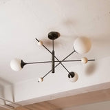 modern-orbital-3-arm-articulated-glass-globe-chandelier-in-copper-and-bronze-finish