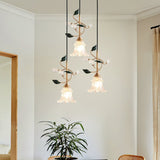 floral-glass-pendant-light-with-crystal-accents-and-pastoral-flower-design