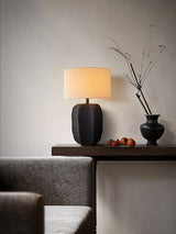handcrafted-black-geometric-ceramic-table-lamp-with-white-fabric-shade-for-modern-living-room
