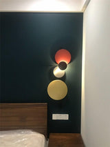 planet-ambient-led-wall-sconce-with-adjustable-metal-disks-for-modern-home-decor-and-indirect-lighting