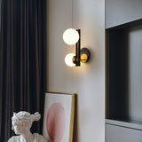 modern-minimalist-glass-globe-wall-sconce-brass-and-black-planeta-wall-lamp