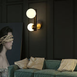 modern-minimalist-glass-globe-wall-sconce-brass-and-black-planeta-wall-lamp
