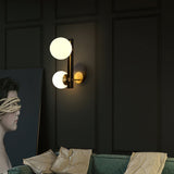 modern-minimalist-glass-globe-wall-sconce-brass-and-black-planeta-wall-lamp