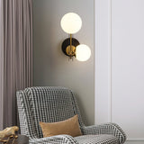 modern-minimalist-glass-globe-wall-sconce-brass-and-black-planeta-wall-lamp