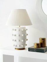 Elegant White Polka Dot Porcelain Table Lamp with Fabric Shade and Brass Base