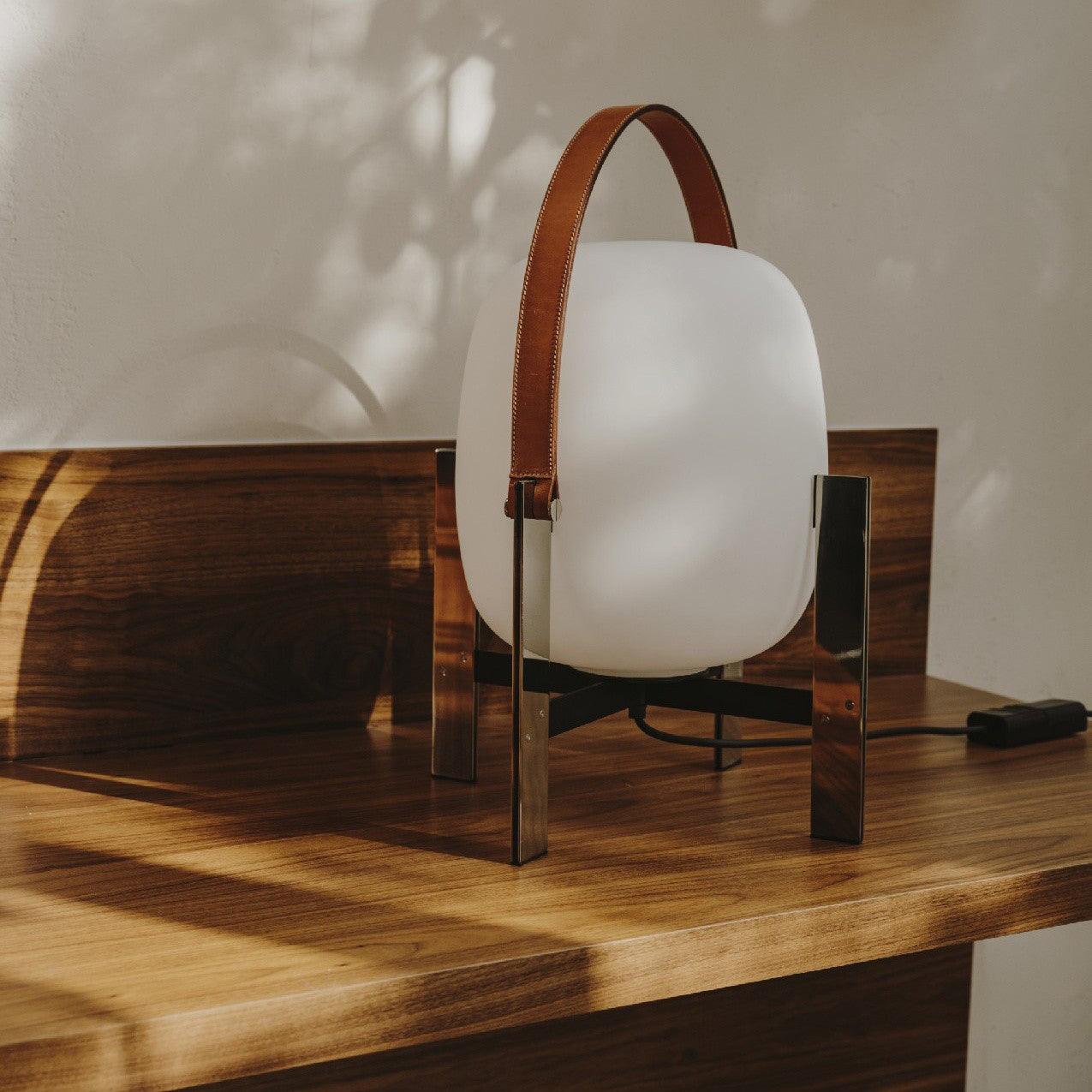 Modern Portable Lantern Table Lamp with Leather Handle and Opal Glass Globe for Bedside Lighting