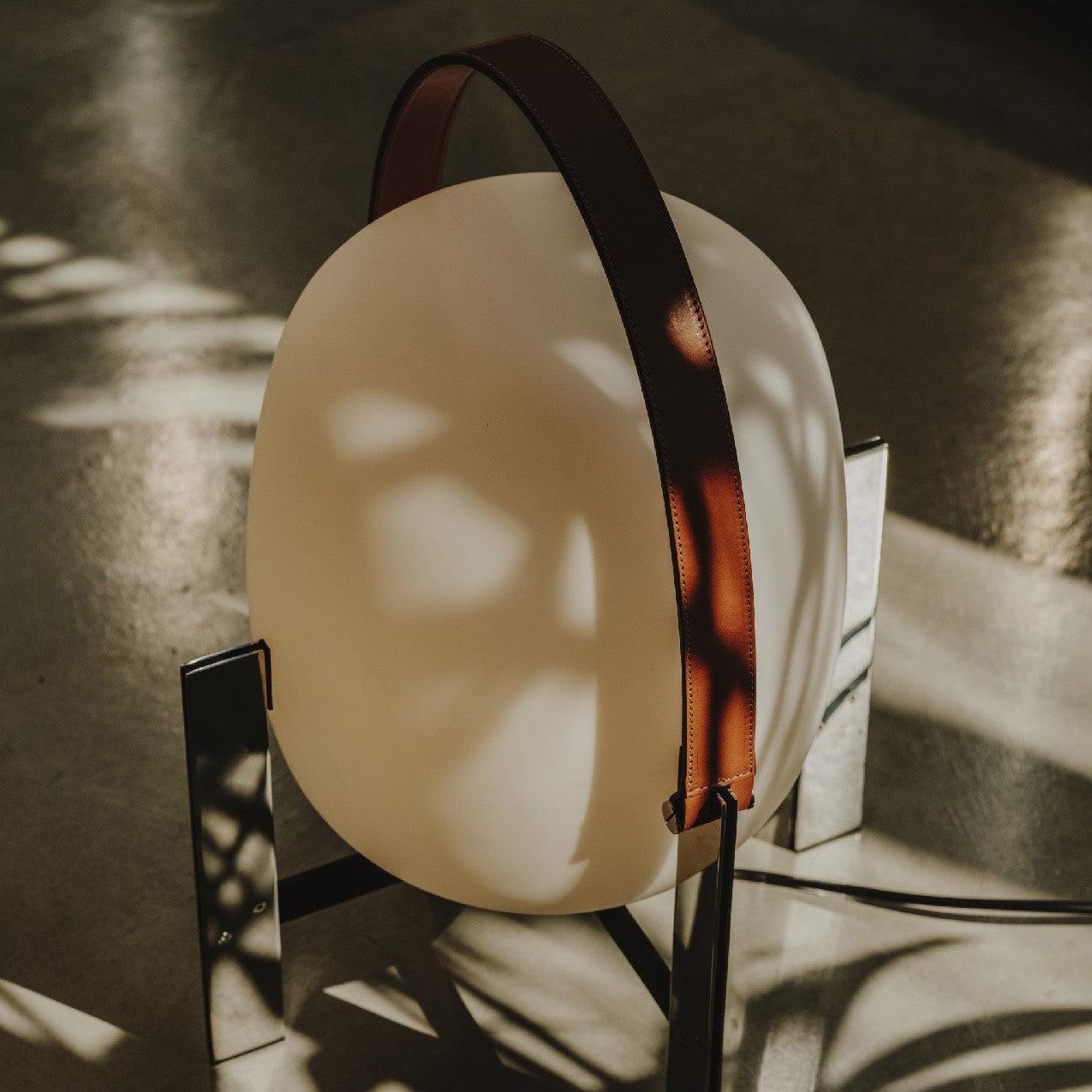 Modern Portable Lantern Table Lamp with Leather Handle and Opal Glass Globe for Bedside Lighting