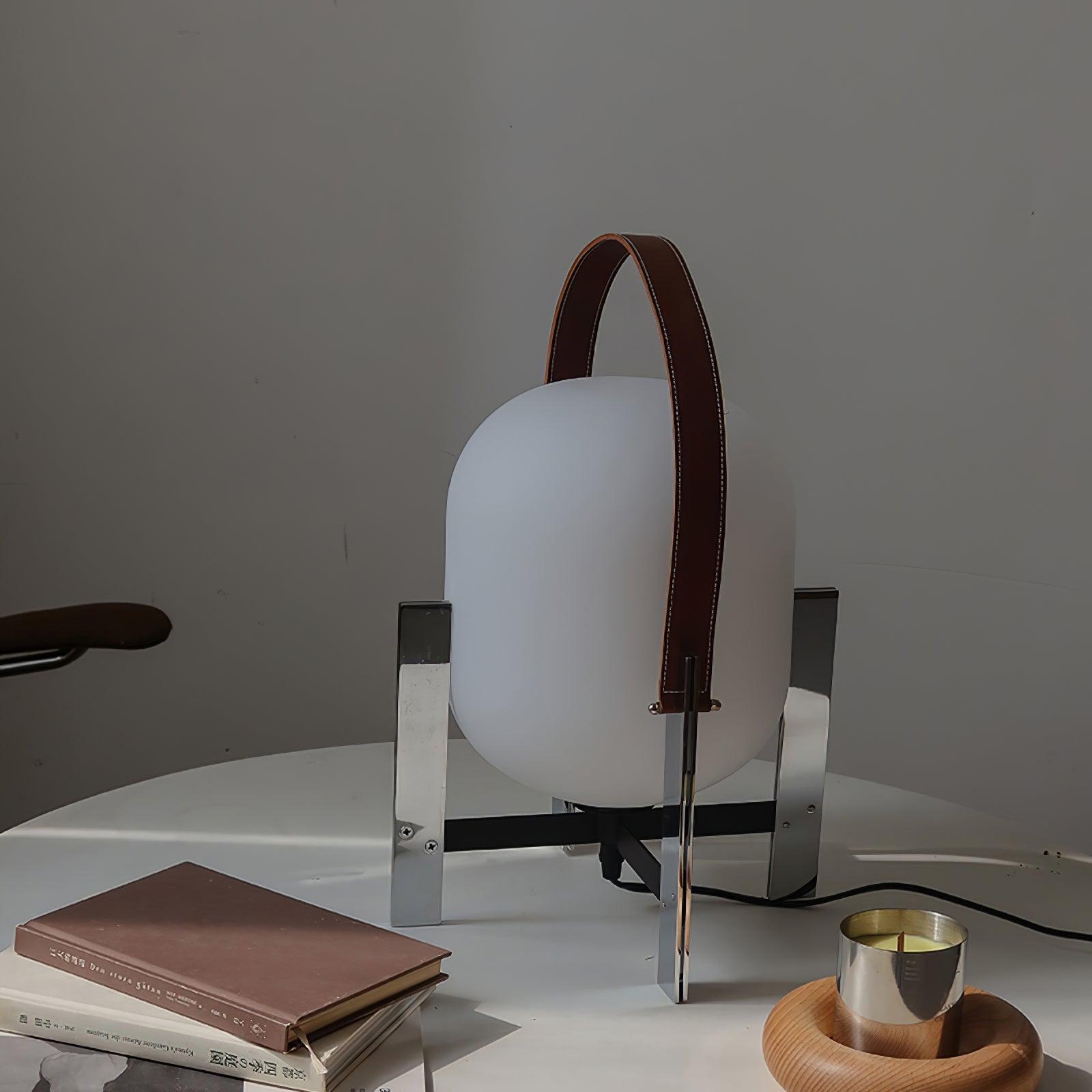 Modern Portable Lantern Table Lamp with Leather Handle and Opal Glass Globe for Bedside Lighting