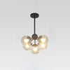 modern-black-geometric-chandelier-with-cognac-glass-globes-for-mid-century-living-spaces