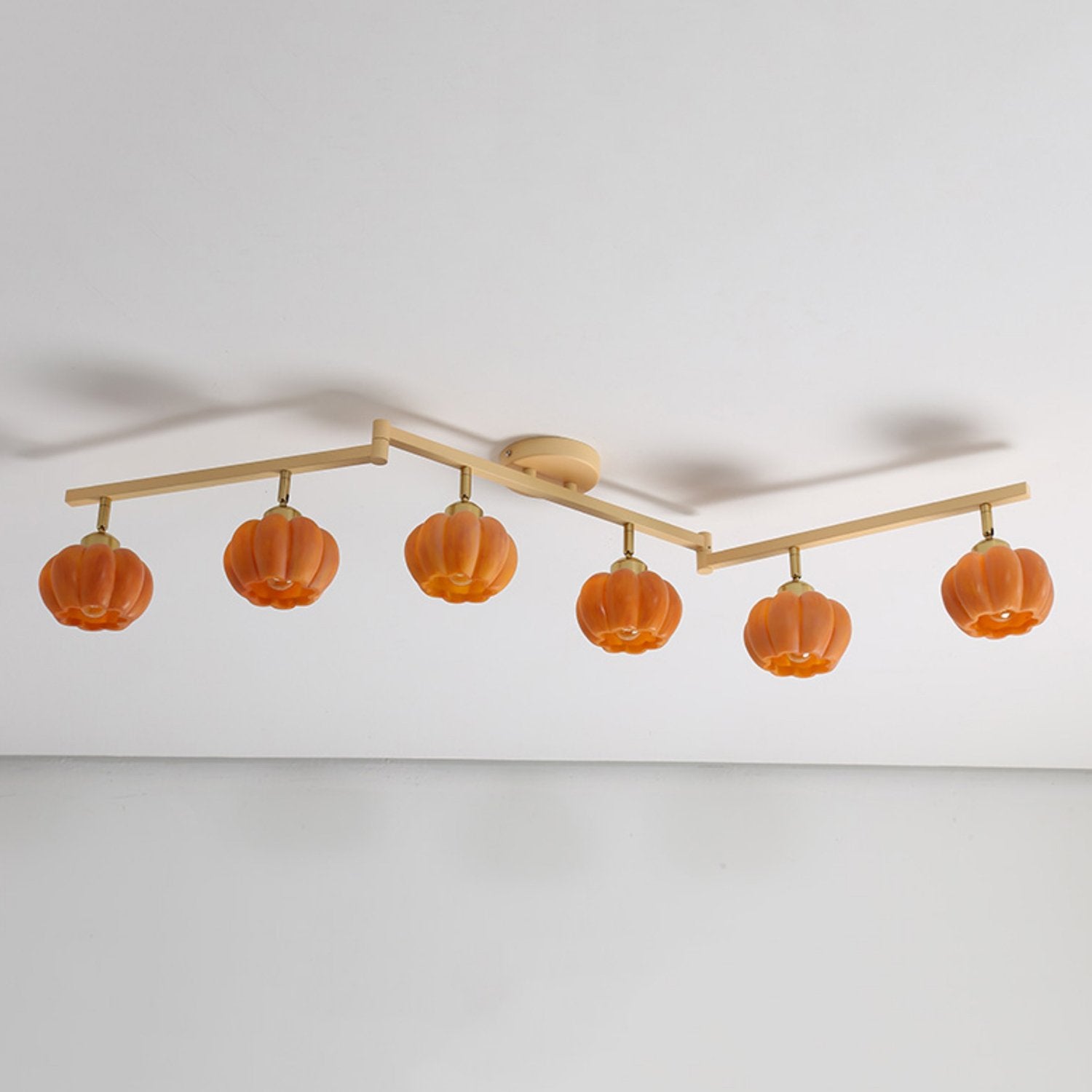 modern-pumpkin-resin-multi-head-ceiling-light-fixture-for-dining-and-living-rooms