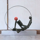 Modern Figurative Reader Sculpture LED Floor Lamp with Circular Frame and Ambient Lighting