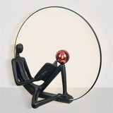 Modern Figurative Reader Sculpture LED Floor Lamp with Circular Frame and Ambient Lighting