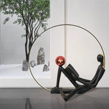 Modern Figurative Reader Sculpture LED Floor Lamp with Circular Frame and Ambient Lighting