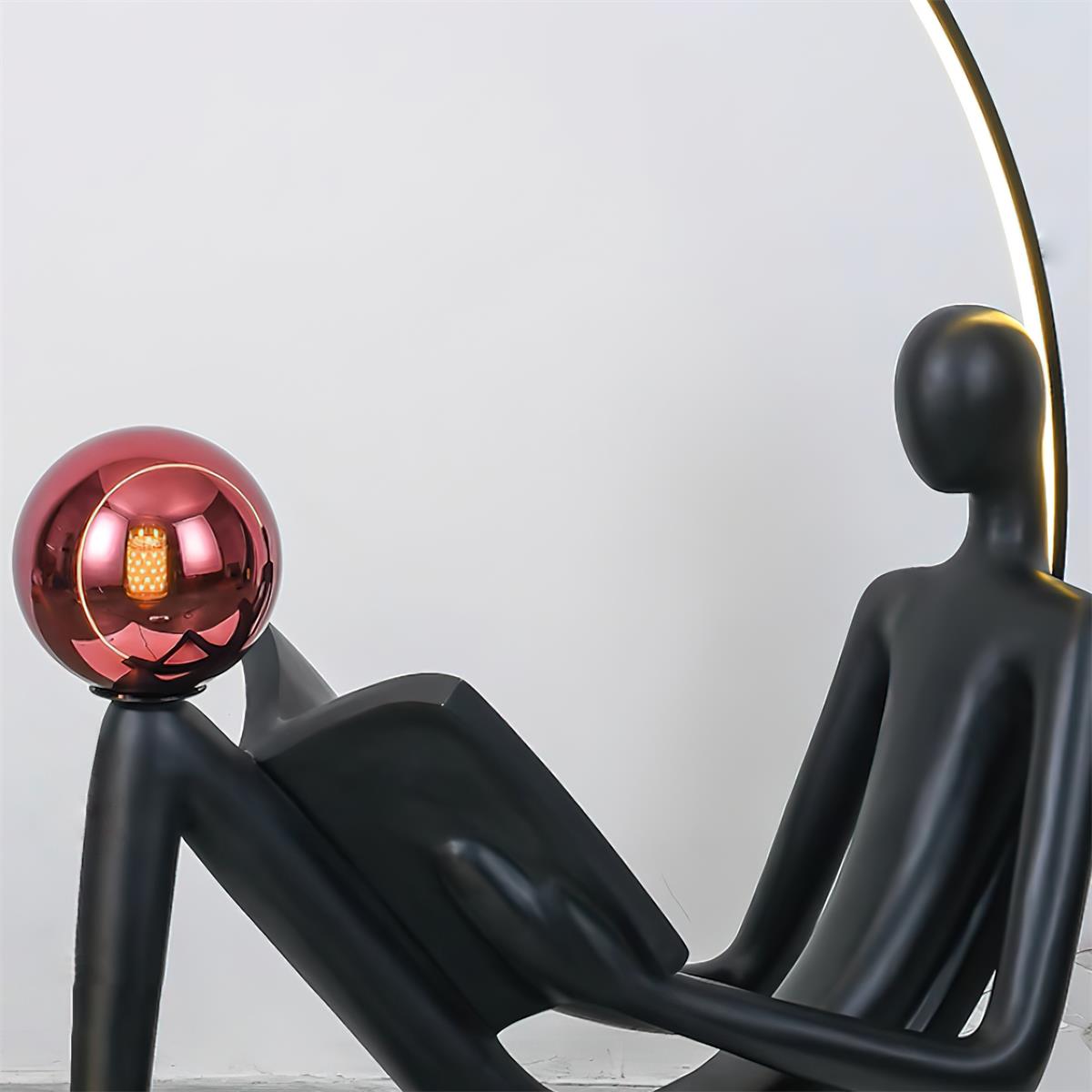 Modern Figurative Reader Sculpture LED Floor Lamp with Circular Frame and Ambient Lighting