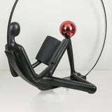 Modern Figurative Reader Sculpture LED Floor Lamp with Circular Frame and Ambient Lighting