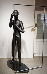 modern-figurative-sculpture-floor-lamp-with-integrated-mirror-and-led-lighting-for-artistic-interiors
