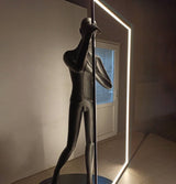 modern-figurative-sculpture-floor-lamp-with-integrated-mirror-and-led-lighting-for-artistic-interiors