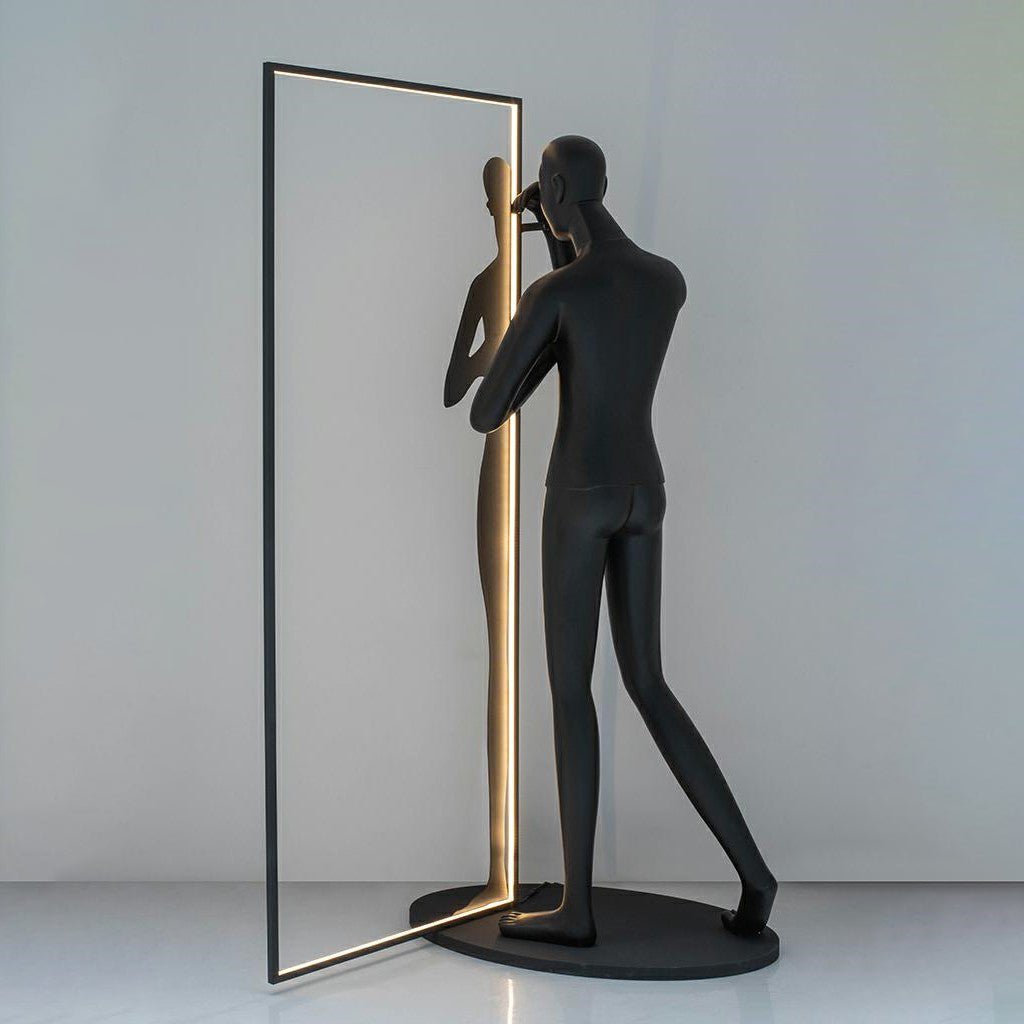 modern-figurative-sculpture-floor-lamp-with-integrated-mirror-and-led-lighting-for-artistic-interiors
