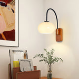 elegant-walnut-wood-wall-lamp-with-white-glass-globe-shade-for-indoor-lighting