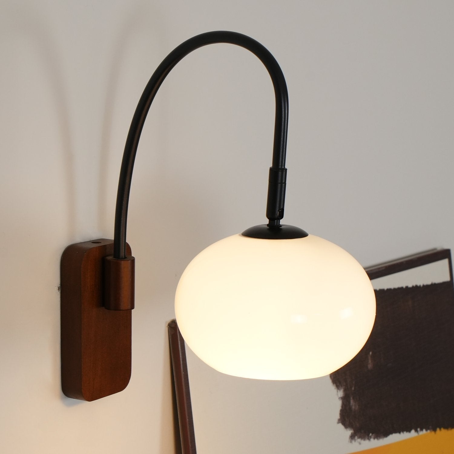 elegant-walnut-wood-wall-lamp-with-white-glass-globe-shade-for-indoor-lighting