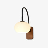 elegant-walnut-wood-wall-lamp-with-white-glass-globe-shade-for-indoor-lighting