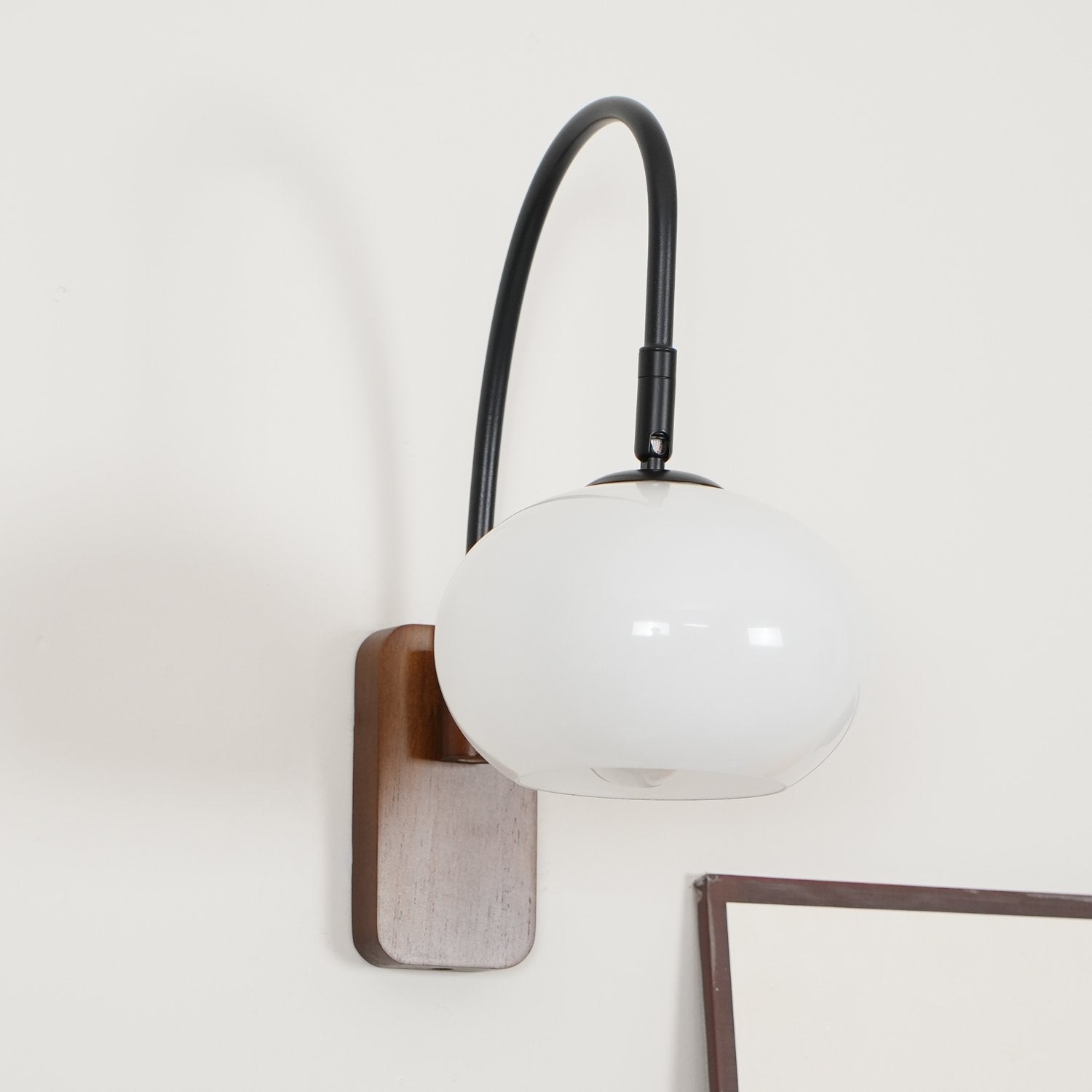 elegant-walnut-wood-wall-lamp-with-white-glass-globe-shade-for-indoor-lighting