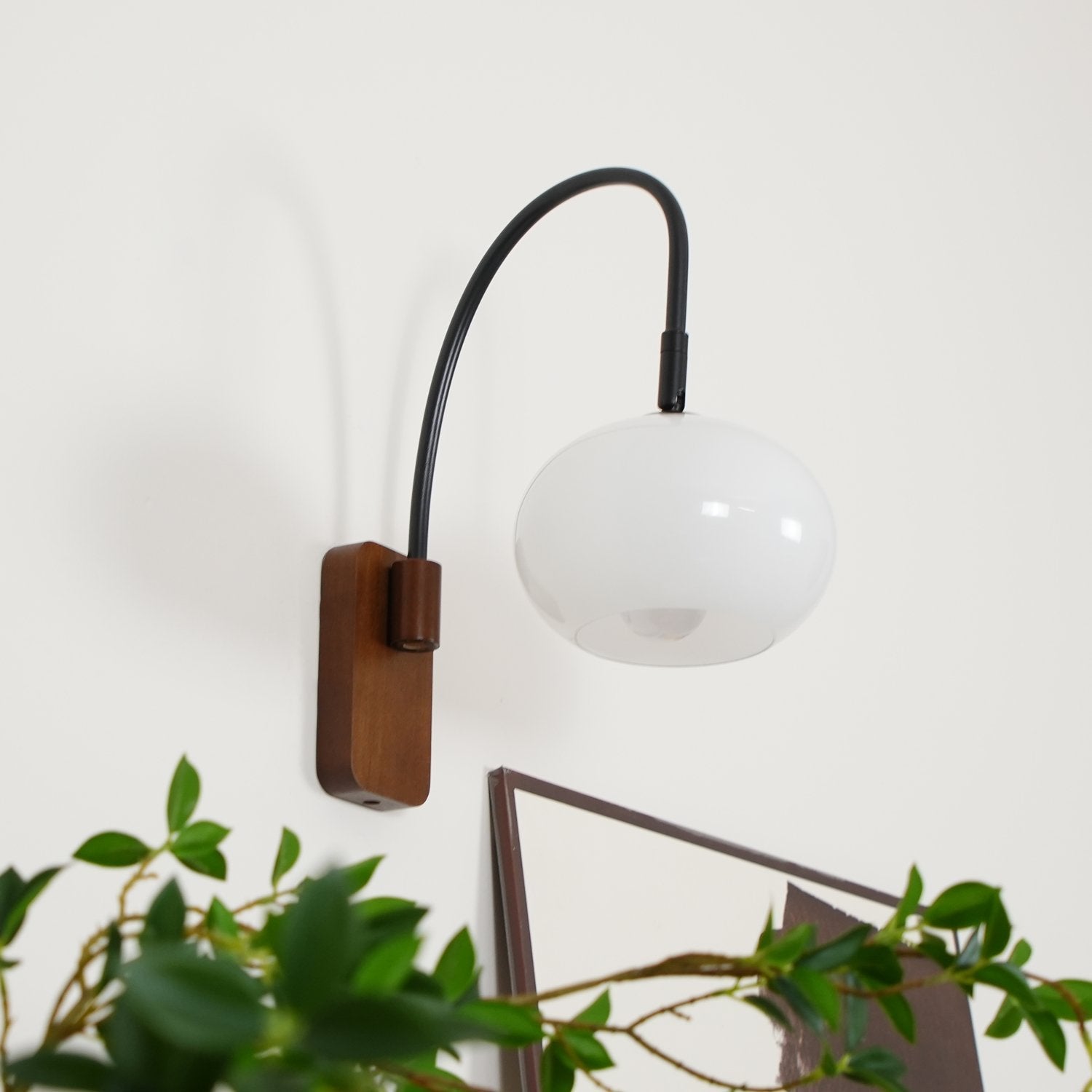 elegant-walnut-wood-wall-lamp-with-white-glass-globe-shade-for-indoor-lighting