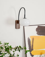 elegant-walnut-wood-wall-lamp-with-white-glass-globe-shade-for-indoor-lighting