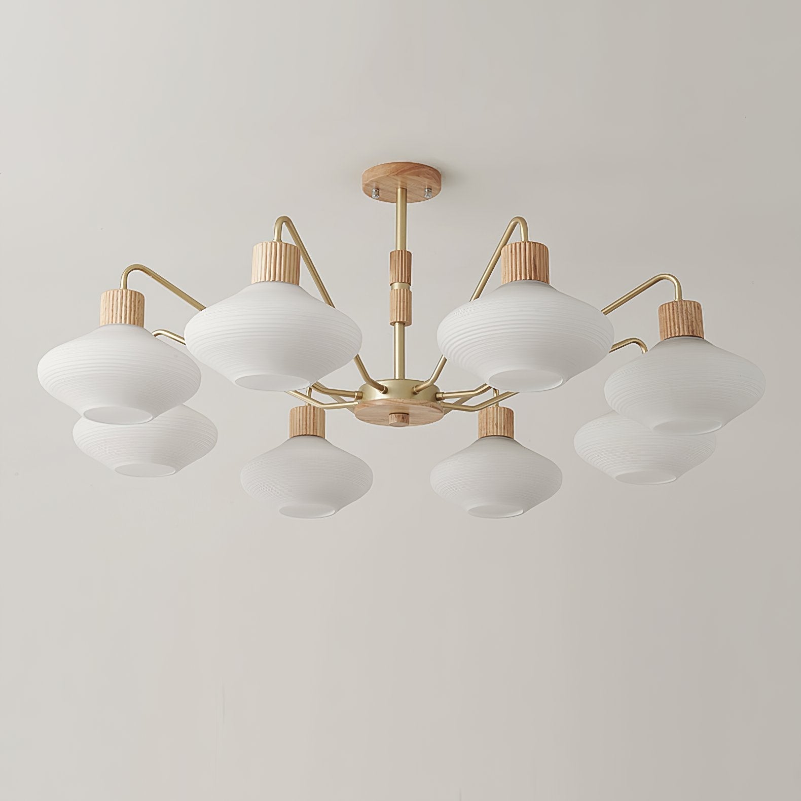 modern-ribbed-rubberwood-chandelier-with-white-glass-globes-and-gold-accents