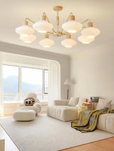 modern-ribbed-rubberwood-chandelier-with-white-glass-globes-and-gold-accents