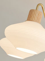 modern-ribbed-rubberwood-chandelier-with-white-glass-globes-and-gold-accents