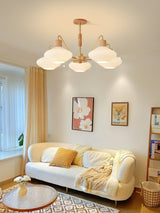 modern-ribbed-rubberwood-chandelier-with-white-glass-globes-and-gold-accents